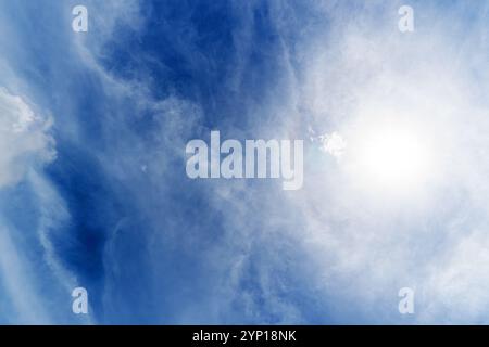 white fluffy clouds in the blue sky Stock Photo