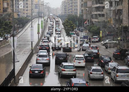 (241128) -- BEIRUT, Nov. 28, 2024 (Xinhua) -- This photo shows vehicles stranded in a traffic jam while moving towards the southern suburb of Beirut, Lebanon, on Nov. 27, 2024. Calm prevails over the border areas in southern Lebanon on Wednesday as a ceasefire between Israel and Lebanon took effect at 4:00 a.m. local time (0200 GMT), according to Lebanese security sources. The main roads in various Lebanese regions, now open, are witnessing heavy traffic after a large number of the displaced quickly returned to their towns in southern and eastern Lebanon to check on their homes and propertie Stock Photo