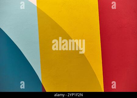 Multi colored abstract textured background. Red, yellow and blue. Stock Photo