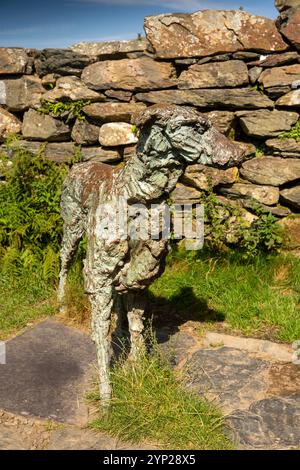 UK, Wales, Gwynedd, Snowdonia, Beddgelert, 2002 Gelert the Faithful Hound sculpture by local sculptor Rawley Clay Stock Photo