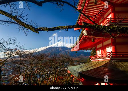 Mount Fujiyama (Mount Fuji), UNESCO World Heritage Site, iconic volcano in autumn with red pagaoda framing the summit, Honshu, Japan, Asia Stock Photo