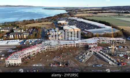 Inverness, UK. 28 Nov 2024. Construction site of the new HMP Highland prison in Inverness, next to the city's largest retail park at Eastfield. The city's current Porterfield Prison has a design capacity of 93 but is today housing 108 prisoners. The new prison has a design capacity of 200 and is expected to open in 2026 at a cost of £209 million. Credit: Andrew Smith/Alamy Stock Photo