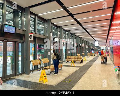 Cardiff, Wales - 24 July 2024: People inside the new bus station in Cardiff city centre Stock Photo