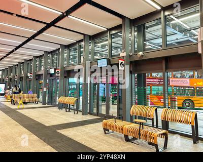 Cardiff, Wales - 24 July 2024: People inside the new bus station in Cardiff city centre Stock Photo