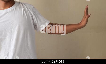 Man concerned in casual clothes posing. People sincere emotions lifestyle concept Stock Photo