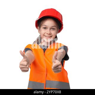 Girl with hardhat and vest pretending to be firefighter on white background. Dreaming of future profession Stock Photo