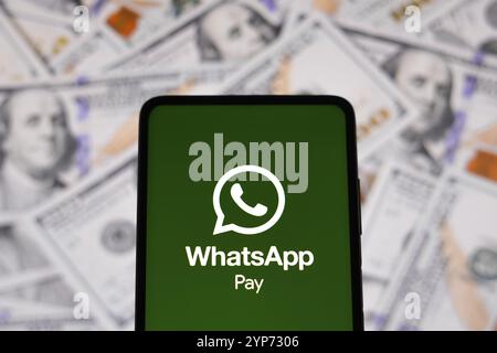 In this photo illustration the WhatsApp Pay logo seen displayed on a smartphone Stock Photo