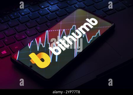In this photo illustration, the Bithumb logo is seen displayed on a ...