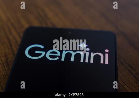 In this photo illustration, the Gemini logo is displayed on a smartphone screen Stock Photo