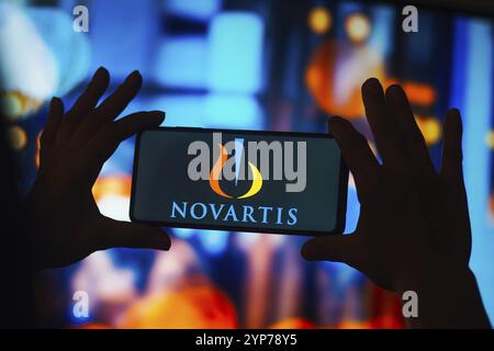 In this photo illustration, the NOVARTIS logo is seen displayed on the ...