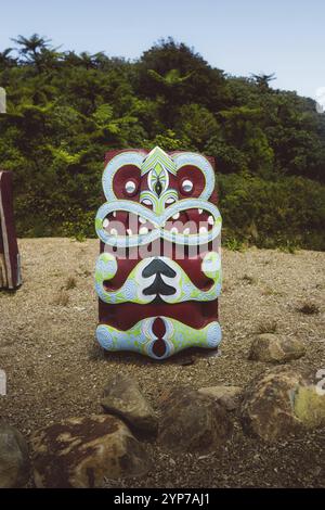 Colourful decorative sculpture in a natural forest area, Coromandel, New Zealand, Oceania Stock Photo