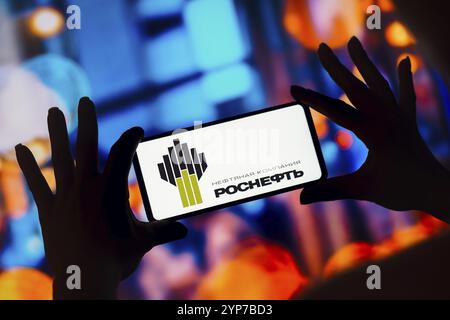 In this photo illustration, the Rosneft logo is displayed on a smartphone screen Stock Photo