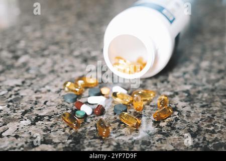 In this photo illustration, several medicine pills are seen on the table Stock Photo