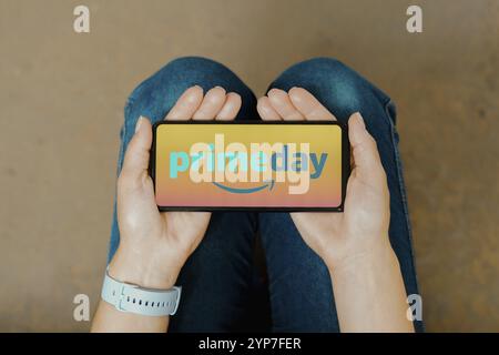 In this photo illustration, the Amazon Prime Day logo is displayed on a smartphone screen Stock Photo