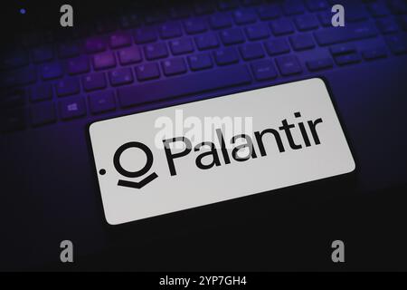 In this photo illustration, the Palantir Technologies logo is displayed on a smartphone screen Stock Photo