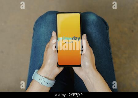 In this photo illustration, the Amazon Prime Day logo is displayed on a smartphone screen Stock Photo
