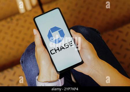 In this photo illustration, the Chase Bank logo is displayed on a smartphone screen Stock Photo