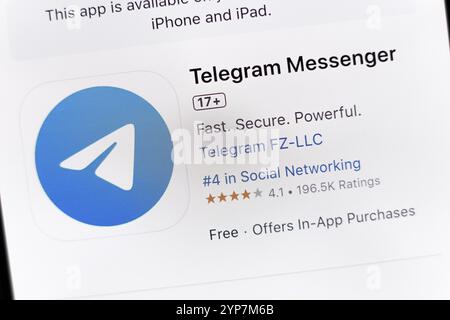 In this photo illustration, the Telegram Messenger app is seen on the Apple Store download page on the smartphone screen Stock Photo