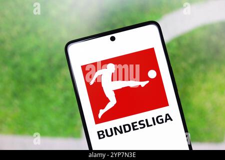 In this photo illustration, the Bundesliga logo is displayed on a smartphone screen Stock Photo