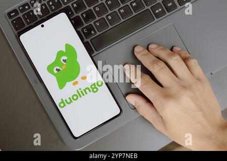 logo is displayed on a smartphone screen Stock Photo
