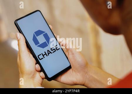 In this photo illustration, the Chase Bank logo is displayed on a smartphone screen Stock Photo