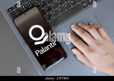 In this photo illustration, the Palantir Technologies logo is displayed on a smartphone screen Stock Photo