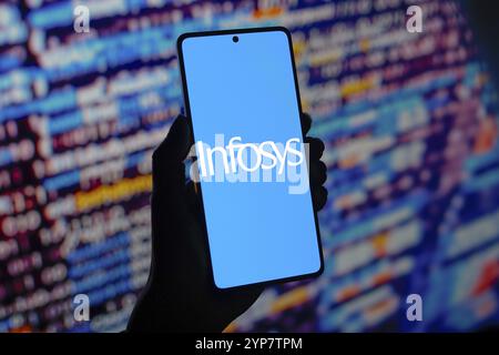 In this photo illustration, the Infosys Limited logo is displayed on a smartphone screen Stock Photo