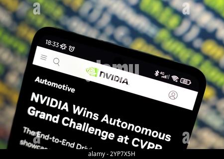 In this photo illustration, the Nvidia logo is displayed on the website on the smartphone screen Stock Photo