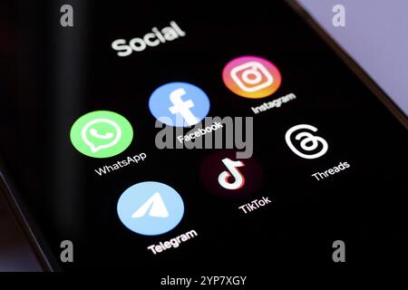 In this photo illustration, WhatsApp, Facebook, Instagram, Telegram, TikTok and Threads apps displayed on your smartphone screen Stock Photo