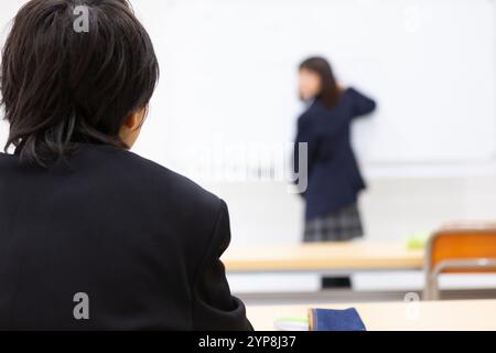 Junior high school students studying at a cram school Stock Photo