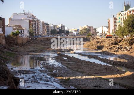 Valencia, Spain. 28th Nov, 2024. The Barranco del Poyo in the town of Paiporta south of Valencia. On November 29, one month has passed since the Isolated Depression at High Levels (DANA) that hit the towns in the south of the Spanish city of Valencia at the end of October and which, in addition to causing millions in economic damages, claimed the lives of more than 200 people. (Photo by David Canales/SOPA Images/Sipa USA) Credit: Sipa USA/Alamy Live News Stock Photo