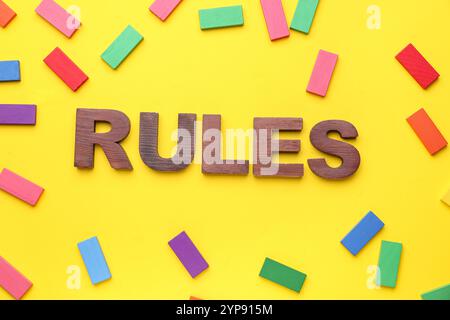 Word RULES with blocks on yellow background Stock Photo