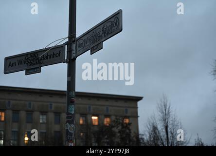 Berlin, Germany. 28th Nov, 2024. A street sign with the inscription 'Am Wriezener Bahnhof' in front of the Berghain techno club in Berlin-Friedrichshain. Credit: Leonie Asendorpf/dpa/Alamy Live News Stock Photo