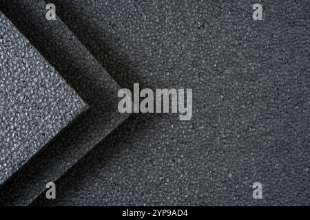 Top view of grey thermal insulation styrofoam sheets stacked on top of each other Stock Photo
