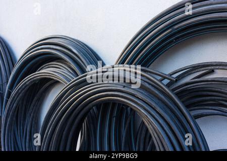 HDPE pipe for water supply. PE pipe plant, Industrial PE pipes. Polyethylene pipe for residential and commercial plumbing. Stock Photo