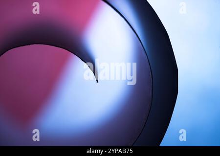 Spiral curves abstract image on blue with pink Stock Photo
