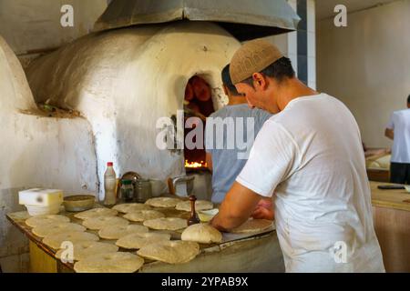 A man is making bread in a bakery Stock Photo