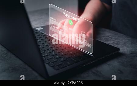 Digital online payment concept. Woman use laptop for online payment. banking and online shopping. Secure technology for financial transaction. Stock Photo