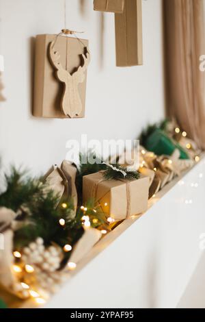 Festively decorated shelf with gifts wrapped for Christmas Stock Photo
