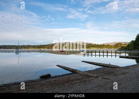 A beautiful morning in the Lake District national park, Cumbria, England. Still water on Lake Windermere at the northern end around Ambleside. Stock Photo