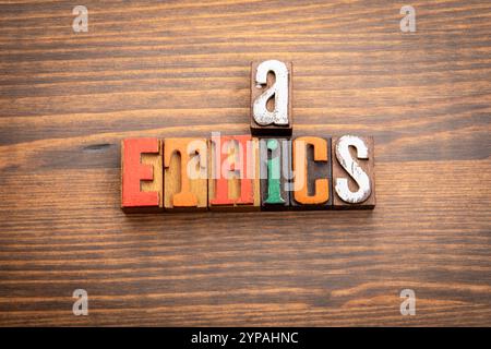 AI Ethics. Words from the letters of the alphabet. Crossword with wooden cubes. Stock Photo