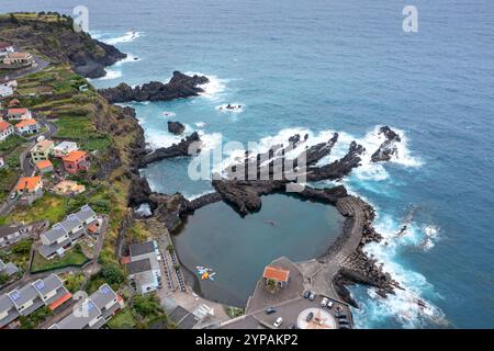 Lava rock coast with natural swimming pool in the Atlantic Ocean in Seixal, aerial view, Madeira Stock Photo