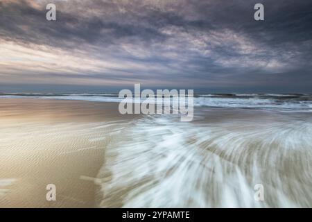 Surf on the North Sea beach, long exposure, Netherlands, Texel, Duenen von Texel Nationalpark Stock Photo