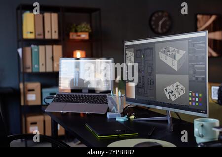 Modern office setting with computer screen displaying architectural designs on monitor. Shelves and office supplies seen in background creating professional atmosphere Stock Photo