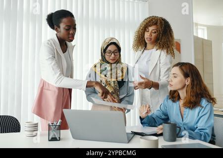 Diverse Group Discussing Business Strategy in Office Stock Photo