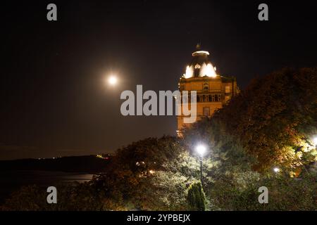 Moon shines in a clear night sky above the Grand Hotel, Scarborough, England. Stock Photo