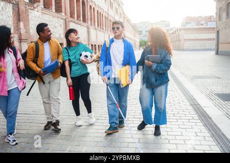 Disability blind, Diverse group of friends having fun outside college university. Students, education concept Stock Photo