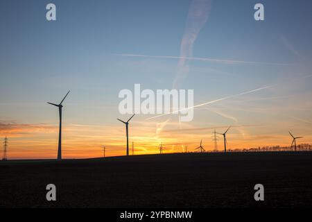 Sunset Over Wind Turbines in the Countryside – Renewable Energy Landscape Stock Photo