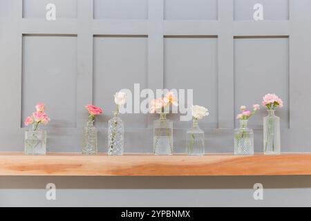 Simple Floral Arrangements in Glass Vases for Elegant Wedding Day Decor Stock Photo