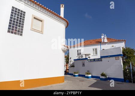 Portugal, Alentejo Region, Vila Nova de Milfontes, Traditional Buildings and Bar on Largo Dom Antonio Martins Quaresma Stock Photo